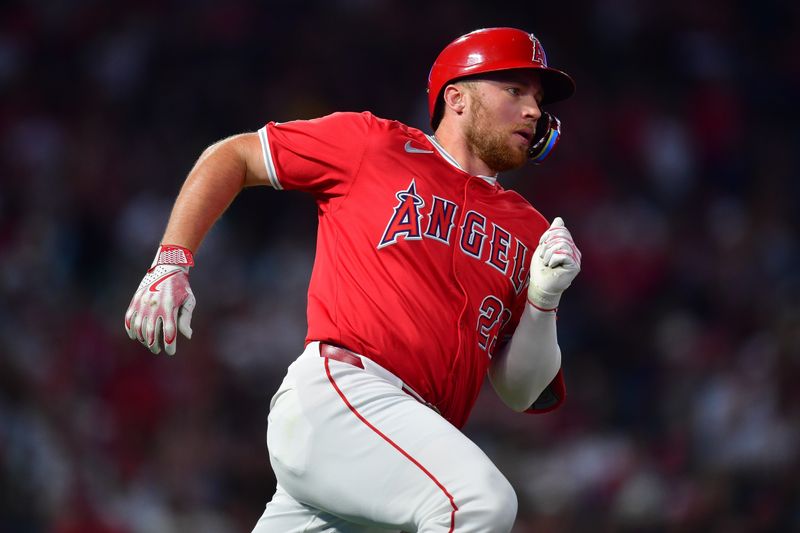 August 16, 2024; Anaheim, California, USA; Los Angeles Angels second base Brandon Drury (23) runs after hitting a double against the Atlanta Braves during the fourth inning at Angel Stadium. Mandatory Credit: Gary A. Vasquez-USA TODAY Sports