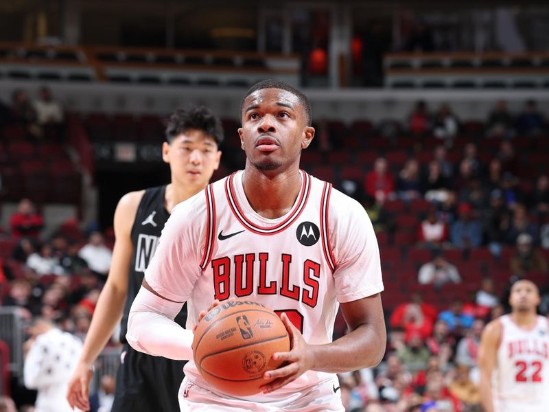 CHICAGO, IL - DECEMBER 2: EJ Liddell #32 of the Chicago Bulls shoots a free throw during the game against the Brooklyn Nets on December 2, 2024 at United Center in Chicago, Illinois. NOTE TO USER: User expressly acknowledges and agrees that, by downloading and or using this photograph, User is consenting to the terms and conditions of the Getty Images License Agreement. Mandatory Copyright Notice: Copyright 2024 NBAE (Photo by Jeff Haynes/NBAE via Getty Images)