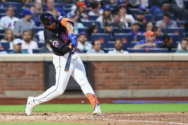 Jun 28, 2024; New York City, New York, USA;  New York Mets right fielder Tyrone Taylor (15) hits a solo home run in the fourth inning against the Houston Astros at Citi Field. Mandatory Credit: Wendell Cruz-USA TODAY Sports