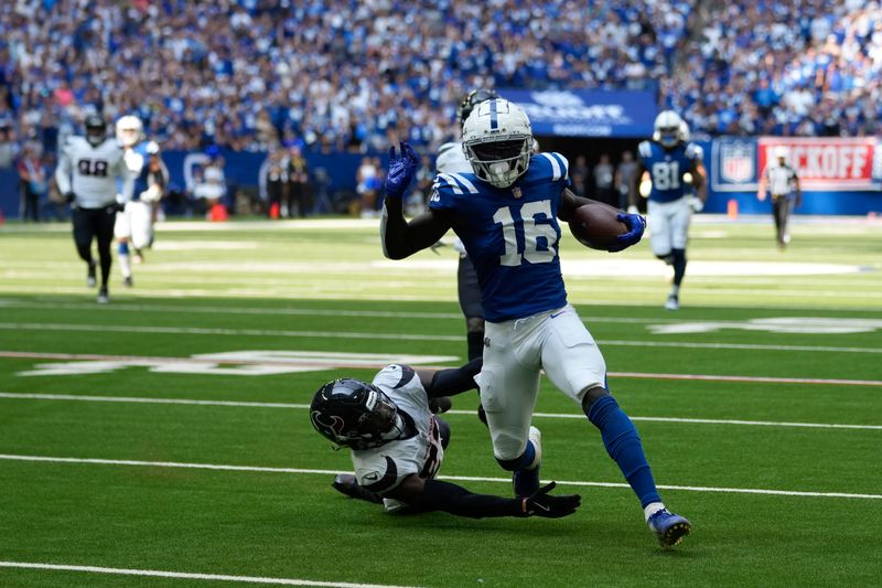 Indianapolis Colts wide receiver Ashton Dulin (16) runs tot he end zone for a touchdown during the second half of an NFL football game against the Houston Texans, Sunday, Sept. 8, 2024, in Indianapolis. (AP Photo/Michael Conroy)