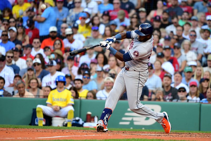 Aug 10, 2024; Boston, Massachusetts, USA;  Houston Astros left fielder Yordan Alavarez (44) hits a two run home run during the sixth inning against the Boston Red Sox at Fenway Park. Mandatory Credit: Bob DeChiara-USA TODAY Sports