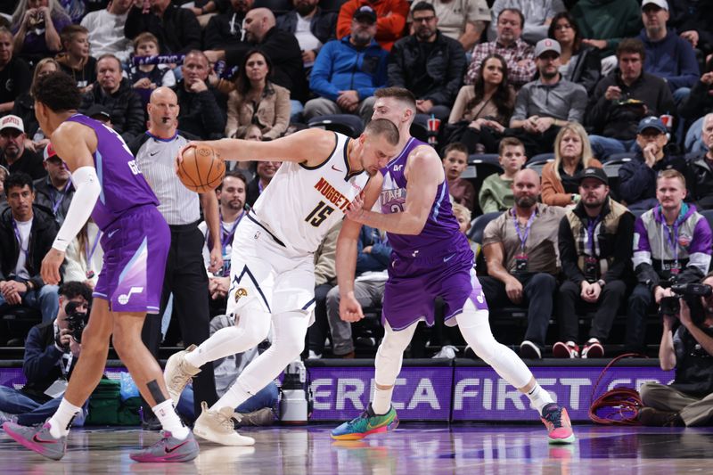 SALT LAKE CITY, UT - WEDNESDAY 27: Nikola Jokic #15 of the Denver Nuggets drives to the basket during the game against the Utah Jazz on Wednesday 27, 2024 at vivint.SmartHome Arena in Salt Lake City, Utah. NOTE TO USER: User expressly acknowledges and agrees that, by downloading and or using this Photograph, User is consenting to the terms and conditions of the Getty Images License Agreement. Mandatory Copyright Notice: Copyright 2024 NBAE (Photo by Melissa Majchrzak/NBAE via Getty Images)