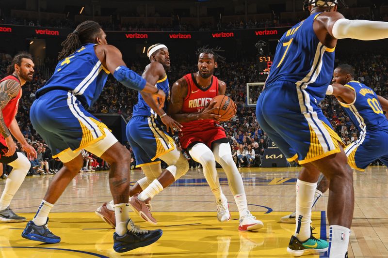 SAN FRANCISCO, CA - APRIL 6: Jae'Sean Tate #8 of the Houston Rockets handles the ball during the game against the Golden State Warriors on April 6, 2025 at Chase Center in San Francisco, California. NOTE TO USER: User expressly acknowledges and agrees that, by downloading and or using this photograph, user is consenting to the terms and conditions of Getty Images License Agreement. Mandatory Copyright Notice: Copyright 2025 NBAE (Photo by Noah Graham/NBAE via Getty Images)