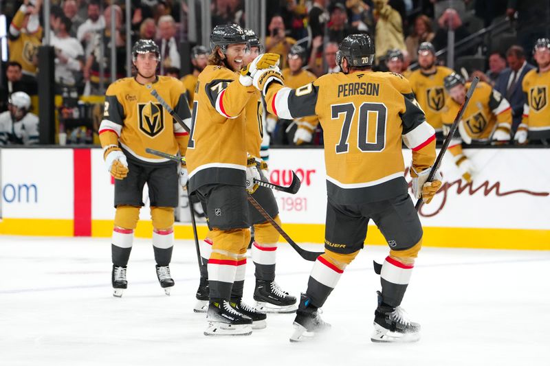 Oct 26, 2024; Las Vegas, Nevada, USA; Vegas Golden Knights center William Karlsson (71) celebrates with Vegas Golden Knights left wing Tanner Pearson (70) after scoring a short-handed goal against the San Jose Sharks during the second period at T-Mobile Arena. Mandatory Credit: Stephen R. Sylvanie-Imagn Images