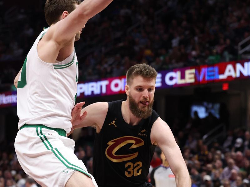 CLEVELAND, OH - MARCH 5: Dean Wade #32 of the Cleveland Cavaliers drives to the basket during the game against the Boston Celtics on March 5, 2024 at Rocket Mortgage FieldHouse in Cleveland, Ohio. NOTE TO USER: User expressly acknowledges and agrees that, by downloading and/or using this Photograph, user is consenting to the terms and conditions of the Getty Images License Agreement. Mandatory Copyright Notice: Copyright 2024 NBAE (Photo by Lauren Leigh Bacho<p><br/></p>/NBAE via Getty Images)