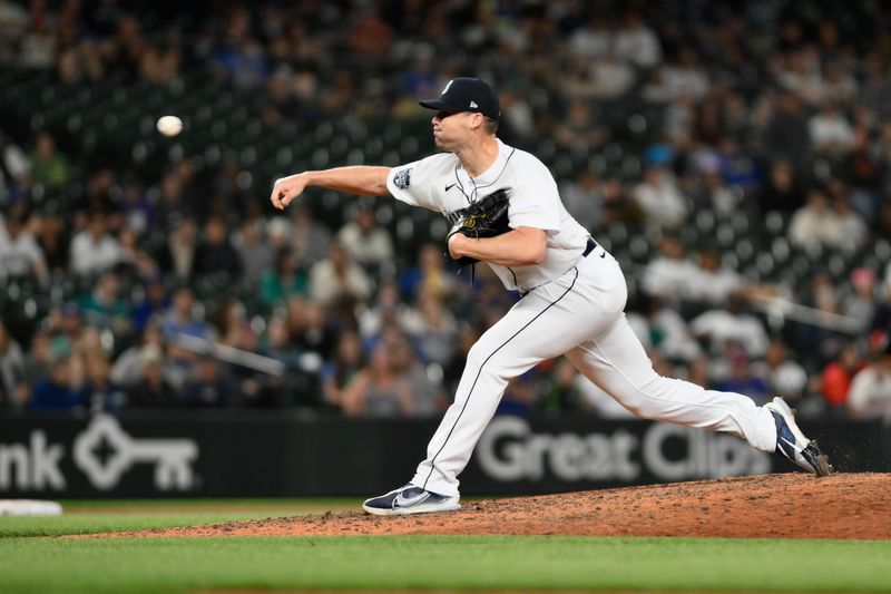 Jun 27, 2023; Seattle, Washington, USA; Seattle Mariners relief pitcher Justin Topa (48) pitches to the Washington Nationals during the tenth inning at T-Mobile Park. Mandatory Credit: Steven Bisig-USA TODAY Sports