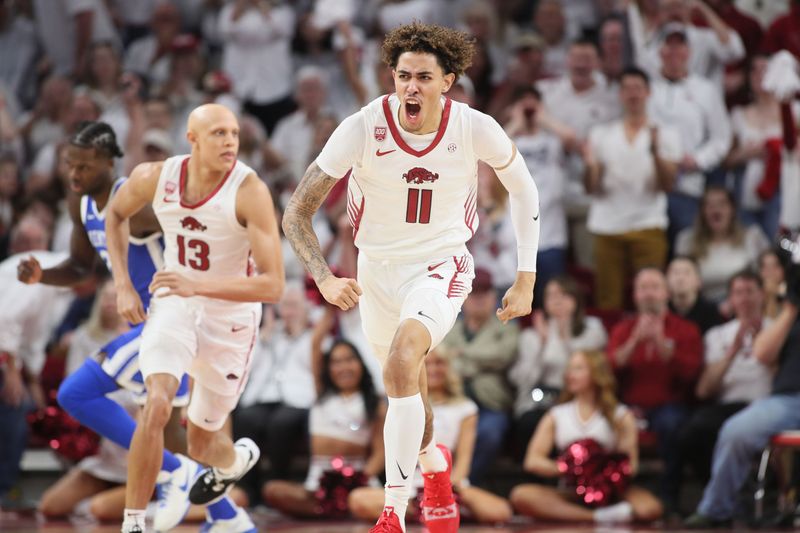 Mar 4, 2023; Fayetteville, Arkansas, USA; Arkansas Razorbacks forward Jalen Graham (11) reacts after dunking the ball in the first half against the Kentucky Wildcats at Bud Walton Arena. Kentucky won 88-79. Mandatory Credit: Nelson Chenault-USA TODAY Sports