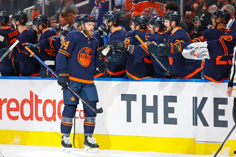 Mar 21, 2024; Edmonton, Alberta, CAN; The Edmonton Oilers celebrate a goal scored by defensemen Mattias Ekholm (14) during the second period against the Buffalo Sabres at Rogers Place. Mandatory Credit: Perry Nelson-USA TODAY Sports