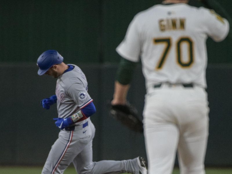 Apr 24, 2025; West Sacramento, California, USA; Texas Rangers catcher Jonah Heim (28) rounds second base after hitting a home run against the Athletics during the fourth inning at Sutter Health Park. Mandatory Credit: Ed Szczepanski-Imagn Images