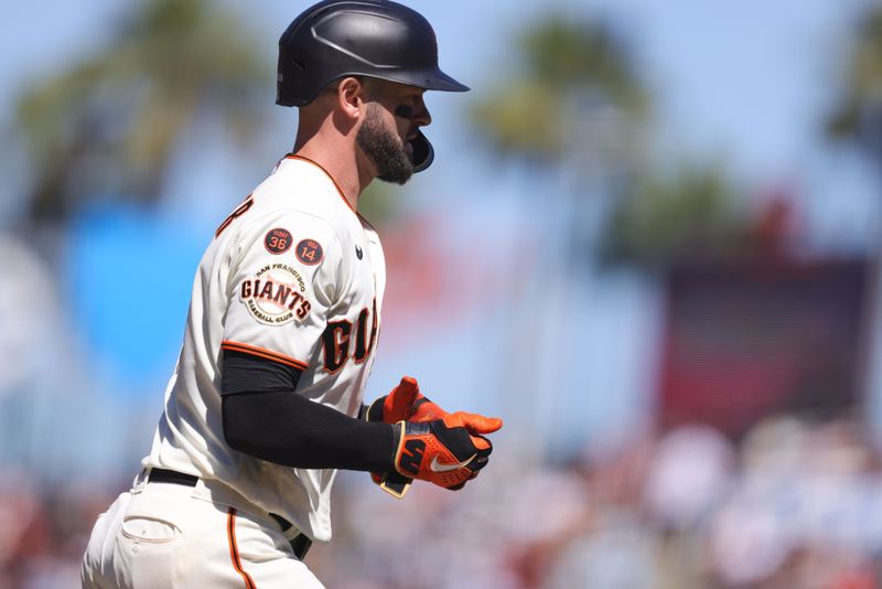 Sep 13, 2023; San Francisco, California, USA; San Francisco Giants left fielder Mitch Haniger (17) draws a walk during the fifth inning against the Cleveland Guardians at Oracle Park. Mandatory Credit: Sergio Estrada-USA TODAY Sports