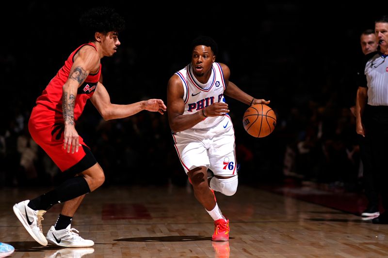 TORONTO, CANADA - OCTOBER 25: Kyle Lowry #7 of the Philadelphia 76ers handles the ball during the game against the Toronto Raptors on October 25, 2024 at the Scotiabank Arena in Toronto, Ontario, Canada.  NOTE TO USER: User expressly acknowledges and agrees that, by downloading and or using this Photograph, user is consenting to the terms and conditions of the Getty Images License Agreement.  Mandatory Copyright Notice: Copyright 2024 NBAE (Photo by Mark Blinch/NBAE via Getty Images)