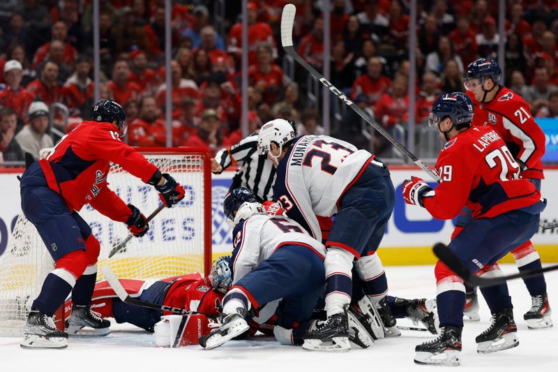 Nov 2, 2024; Washington, District of Columbia, USA; Columbus Blue Jackets right wing Kevin Labanc (62) scores a goal on Washington Capitals goaltender Logan Thompson (48) in the second period at Capital One Arena. Mandatory Credit: Geoff Burke-Imagn Images