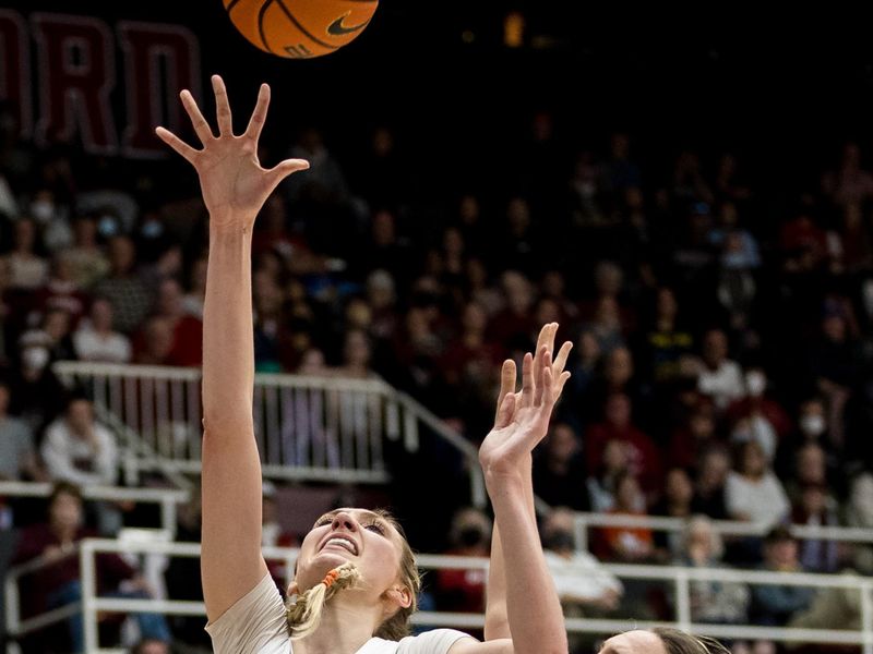 Feb 20, 2023; Stanford, California, USA;  Stanford Cardinal forward Cameron Brink (22) shoots over UCLA Bruins forward Emily Bessoir (11) during the first half at Maples Pavilion. Mandatory Credit: John Hefti-USA TODAY Sports