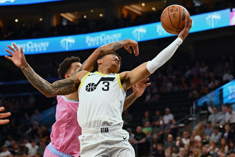 SALT LAKE CITY, UTAH - OCTOBER 04:  Keyonte George #3 of the Utah Jazz is fouled by Jonah Bolden #43 of the New Zealand Breakers while driving to the basket in the first half on October 04, 2024 at Delta Center in Salt Lake City, Utah.   NOTE TO USER: User expressly acknowledges and agrees that, by downloading and or using this photograph, User is consenting to the terms and conditions of the Getty Images License Agreement.  (Photo by Jamie Sabau/Getty Images)