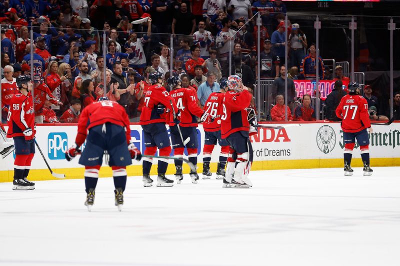 Apr 28, 2024; Washington, District of Columbia, USA; Washington Capitals players react after the final horn against the New York Rangers in game four of the first round of the 2024 Stanley Cup Playoffs at Capital One Arena. Mandatory Credit: Geoff Burke-USA TODAY Sports
