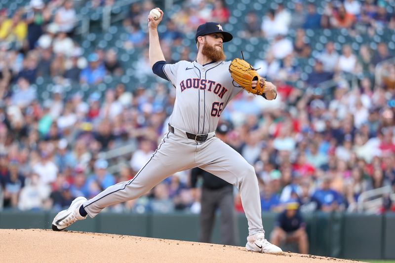 Jul 5, 2024; Minneapolis, Minnesota, USA; Houston Astros starting pitcher Shawn Dubin (66) pitches against the Minnesota Twins during the first inning at Target Field. Mandatory Credit: Matt Krohn-USA TODAY Sports