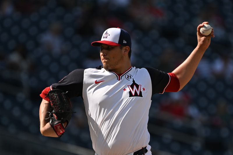 Sep 15, 2024; Washington, District of Columbia, USA; Washington Nationals relief pitcher Robert Garcia (61) throws a pitch against the Miami Marlins during the seventh inning at Nationals Park. Mandatory Credit: Rafael Suanes-Imagn Images