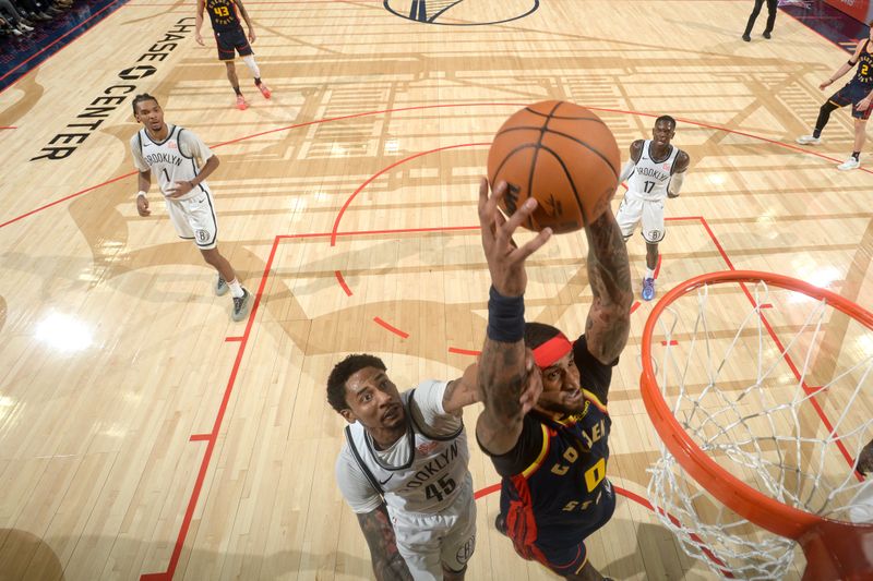 SAN FRANCISCO, CA - NOVEMBER 25: Gary Payton II #0 of the Golden State Warriors drives to the basket during the game against the Brooklyn Nets on November 25, 2024 at Chase Center in San Francisco, California. NOTE TO USER: User expressly acknowledges and agrees that, by downloading and or using this photograph, user is consenting to the terms and conditions of Getty Images License Agreement. Mandatory Copyright Notice: Copyright 2024 NBAE (Photo by Noah Graham/NBAE via Getty Images)