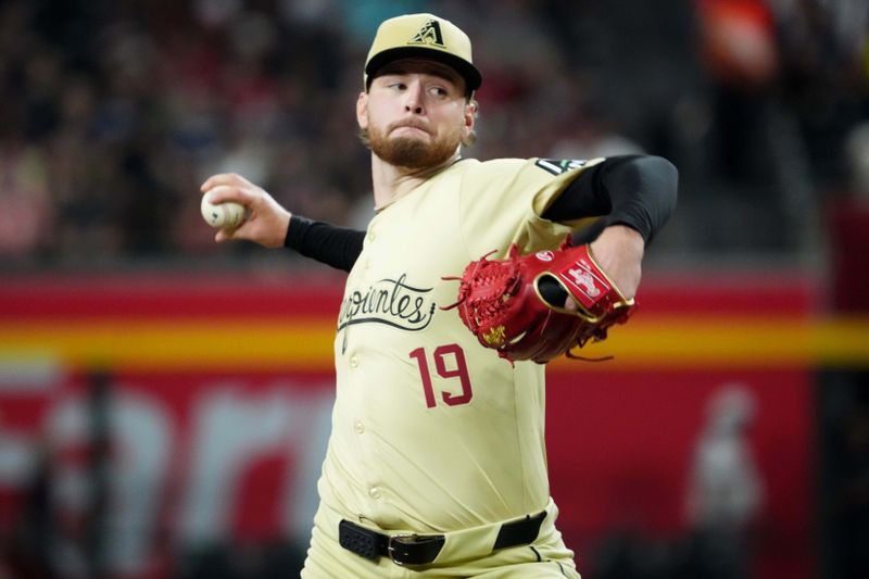 Jul 30, 2024; Phoenix, Arizona, USA; Arizona Diamondbacks pitcher Ryne Nelson (19) pitches against the Washington Nationals during the sixth inning at Chase Field. Mandatory Credit: Joe Camporeale-USA TODAY Sports