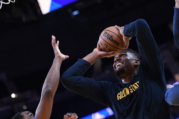 SAN FRANCISCO, CA - DECEMBER 28: Kevon Looney #5 of the Golden State Warriors warms up before the game against the Miami Heat on December 28, 2023 at Chase Center in San Francisco, California. NOTE TO USER: User expressly acknowledges and agrees that, by downloading and or using this photograph, user is consenting to the terms and conditions of Getty Images License Agreement. Mandatory Copyright Notice: Copyright 2023 NBAE (Photo by Noah Graham/NBAE via Getty Images)