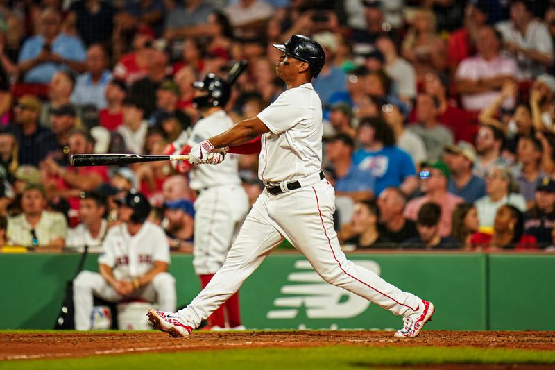 Jul 23, 2023; Boston, Massachusetts, USA; Boston Red Sox third baseman Rafael Devers (11) hits a home run against the New York Mets in the seventh inning at Fenway Park. Mandatory Credit: David Butler II-USA TODAY Sports