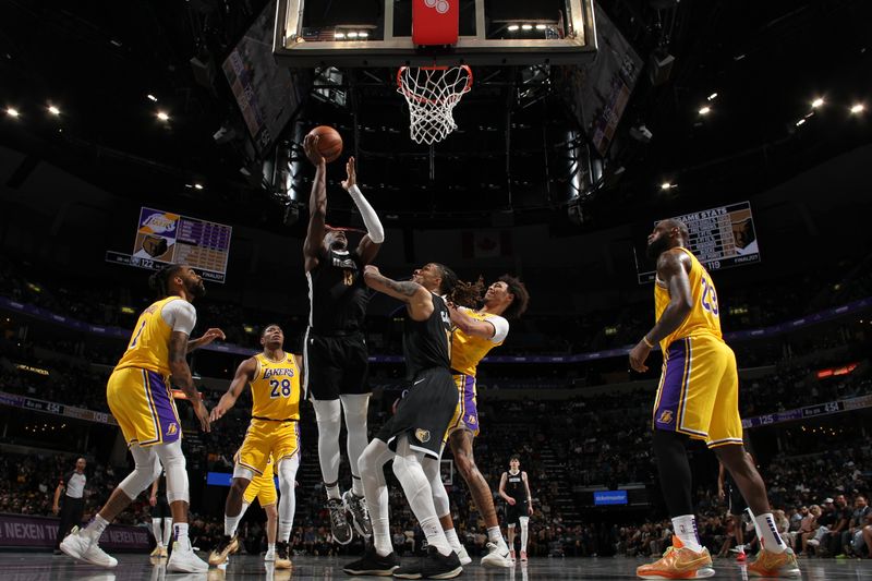 MEMPHIS, TN - MARCH 27: Jaren Jackson Jr. #13 of the Memphis Grizzlies drives to the basket during the game against the Los Angeles Lakers on March 27, 2024 at FedExForum in Memphis, Tennessee. NOTE TO USER: User expressly acknowledges and agrees that, by downloading and or using this photograph, User is consenting to the terms and conditions of the Getty Images License Agreement. Mandatory Copyright Notice: Copyright 2024 NBAE (Photo by Joe Murphy/NBAE via Getty Images)