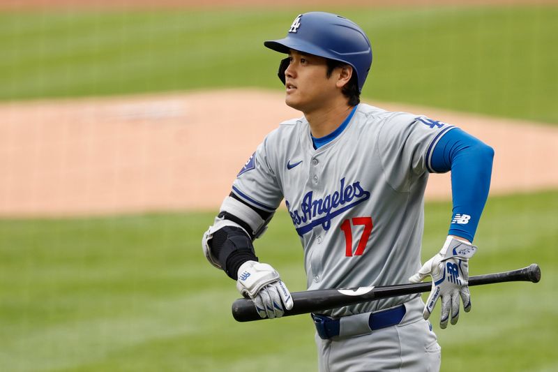 Apr 25, 2024; Washington, District of Columbia, USA; Los Angeles Dodgers designated hitter Shohei Ohtani (17) walks back to the dugout after striking out against the Washington Nationals during the first inning at Nationals Park. Mandatory Credit: Geoff Burke-USA TODAY Sports