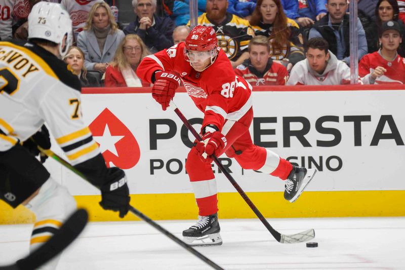 Nov 23, 2024; Detroit, Michigan, USA; Detroit Red Wings right wing Patrick Kane (88) shoots the puck during the second period of the game against the Boston Bruins at Little Caesars Arena. Mandatory Credit: Brian Bradshaw Sevald-Imagn Images