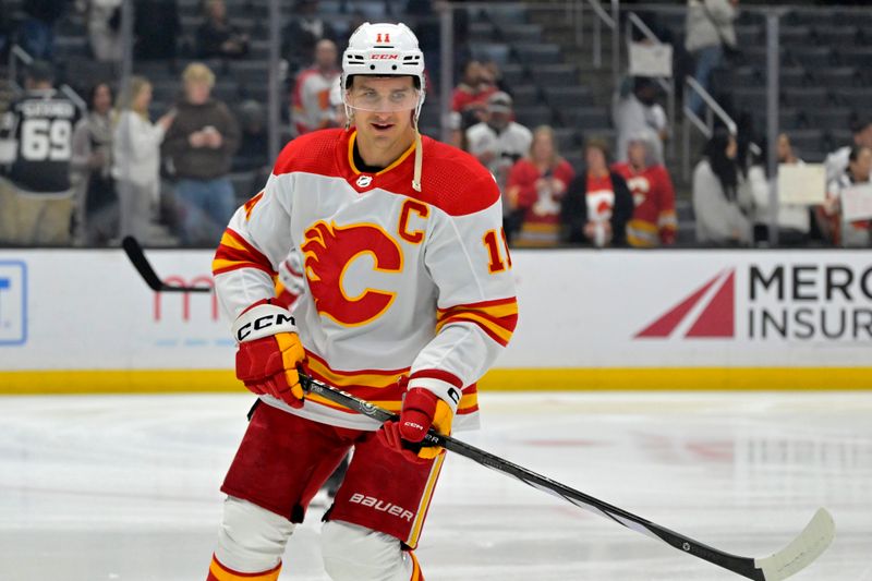 Apr 11, 2024; Los Angeles, California, USA;  Calgary Flames center Mikael Backlund (11) warms up prior to the game against the Los Angeles Kings at Crypto.com Arena. Mandatory Credit: Jayne Kamin-Oncea-USA TODAY Sports