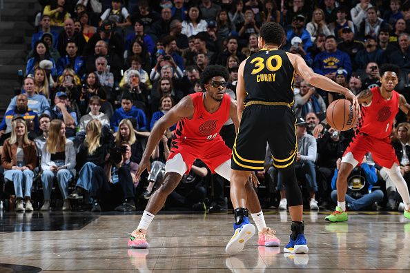 SAN FRANCISCO, CA - DECEMBER 23: Scoot Henderson #00 of the Portland Trail Blazers plays defense during the game against the Golden State Warriors on December 23, 2023 at Chase Center in San Francisco, California. NOTE TO USER: User expressly acknowledges and agrees that, by downloading and or using this photograph, user is consenting to the terms and conditions of Getty Images License Agreement. Mandatory Copyright Notice: Copyright 2023 NBAE (Photo by Noah Graham/NBAE via Getty Images)