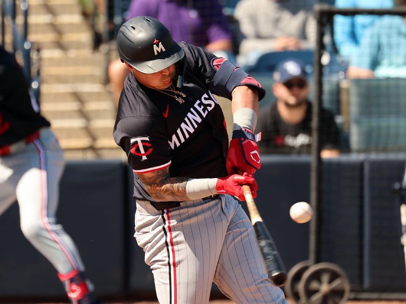 Feb 26, 2024; Tampa, Florida, USA; Minnesota Twins third baseman Jose Miranda (64) singles during the first inning against the New York Yankees at George M. Steinbrenner Field. Mandatory Credit: Kim Klement Neitzel-USA TODAY Sports