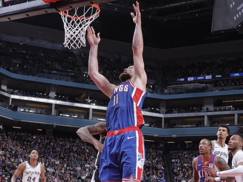 SACRAMENTO, CA - DECEMBER 1: Domantas Sabonis #11 of the Sacramento Kings shoots the ball during the game against the San Antonio Spurs on December 1, 2024 at Golden 1 Center in Sacramento, California. NOTE TO USER: User expressly acknowledges and agrees that, by downloading and or using this Photograph, user is consenting to the terms and conditions of the Getty Images License Agreement. Mandatory Copyright Notice: Copyright 2024 NBAE (Photo by Rocky Widner/NBAE via Getty Images)