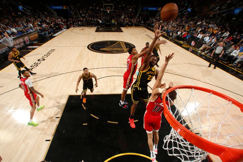 SAN FRANCISCO, CA - JANUARY 10: Andrew Wiggins #22 of the Golden State Warriors shoots the ball during the game against the New Orleans Pelicans on January 10, 2024 at Chase Center in San Francisco, California. NOTE TO USER: User expressly acknowledges and agrees that, by downloading and or using this photograph, user is consenting to the terms and conditions of Getty Images License Agreement. Mandatory Copyright Notice: Copyright 2024 NBAE (Photo by Jed Jacobsohn/NBAE via Getty Images)