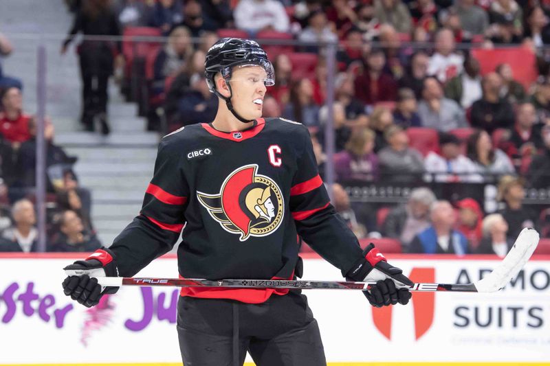 Oct 17, 2024; Ottawa, Ontario, CAN; Ottawa Senators left wing Brady Tkachuk (7) looks up the ice in the second period against the New Jersey Devils at the Canadian Tire Centre. Mandatory Credit: Marc DesRosiers-Imagn Images