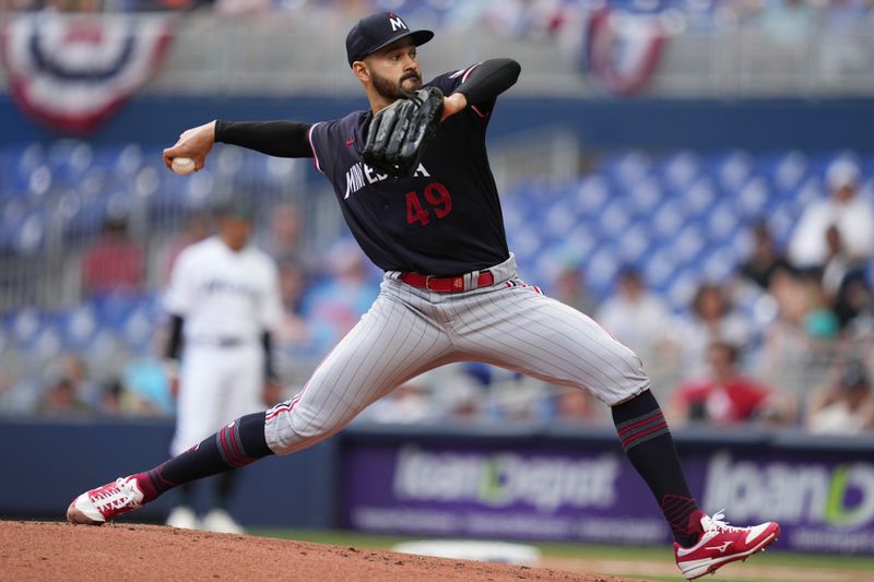 Apr 5, 2023; Miami, Florida, USA;  Minnesota Twins starting pitcher Pablo Lopez (49) pitches against the Miami Marlins in the first inning at loanDepot Park. Mandatory Credit: Jim Rassol-USA TODAY Sports