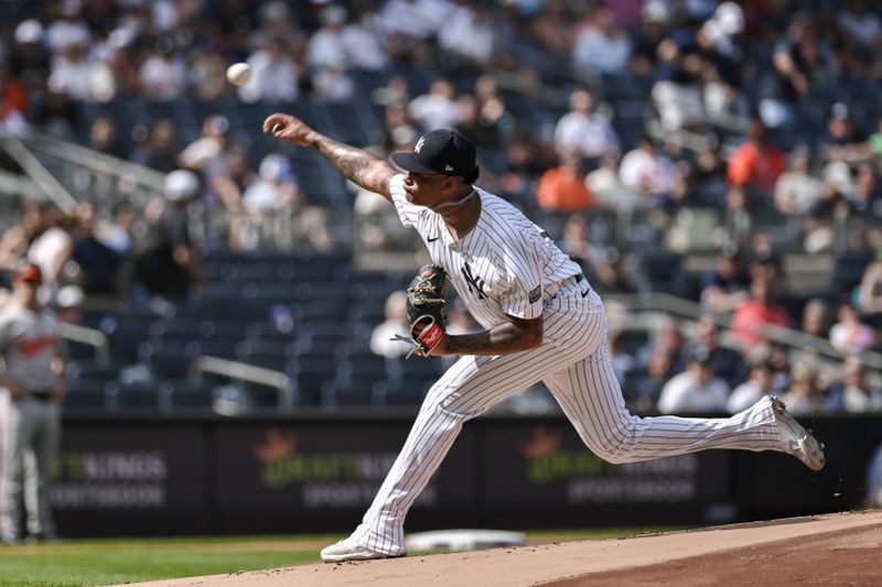 Jun 20, 2024; Bronx, New York, USA; New York Yankees pitcher Luis Gil (81) pitches against the Baltimore Orioles during the first inning at Yankee Stadium. Mandatory Credit: John Jones-USA TODAY Sports