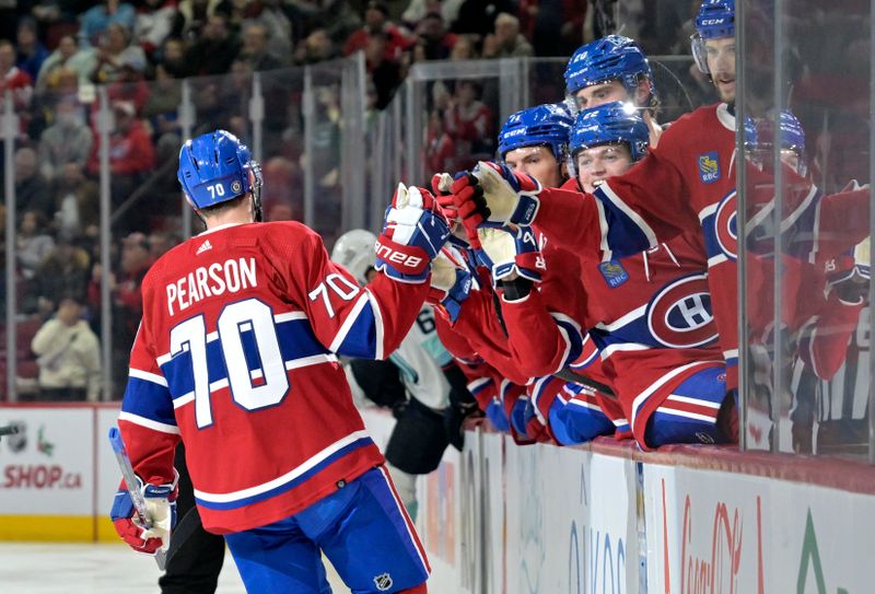 Dec 4, 2023; Montreal, Quebec, CAN; Montreal Canadiens forward Tanner Pearson (70) celebrates with teammates after scoring a goal against the Seattle Kraken during the second period at the Bell Centre. Mandatory Credit: Eric Bolte-USA TODAY Sports