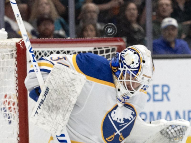 Mar 19, 2026; San Jose, California, USA; The puck bounces off the helmet of Buffalo Sabres goaltender Alex Lyon (34) during the second period against the San Jose Sharks at SAP Center at San Jose. Mandatory Credit: D. Ross Cameron-Imagn Images
