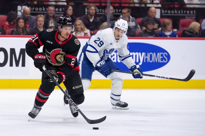 Sep 24, 2024; Ottawa, Ontario, CAN; Ottawa Senators right wing Nick Cousins (21) skates with the puck in the second period against the Toronto Maple Leafs at the Canadian Tire Centre. Mandatory Credit: Marc DesRosiers-Imagn Images