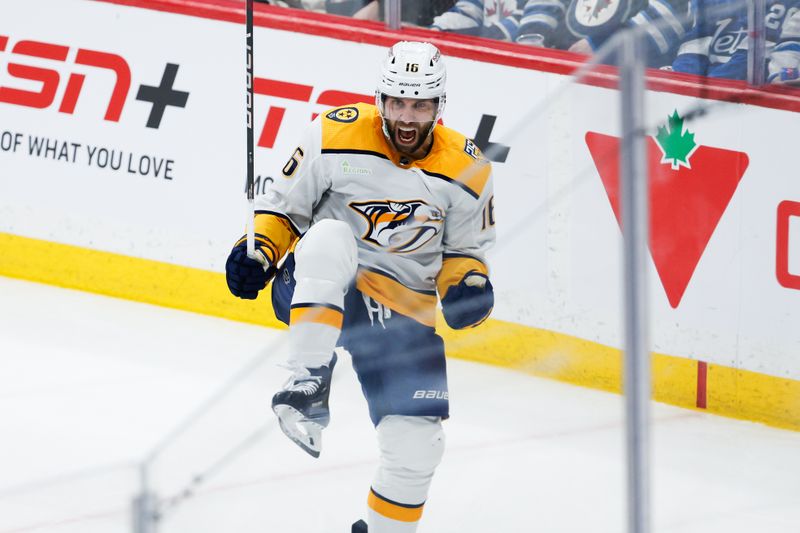 Mar 13, 2024; Winnipeg, Manitoba, CAN; Nashville Predators forward Jason Zucker (16) celebrates his goal on Winnipeg Jets goalie Connor Hellebuyck (37) during the third period at Canada Life Centre. Mandatory Credit: Terrence Lee-USA TODAY Sports