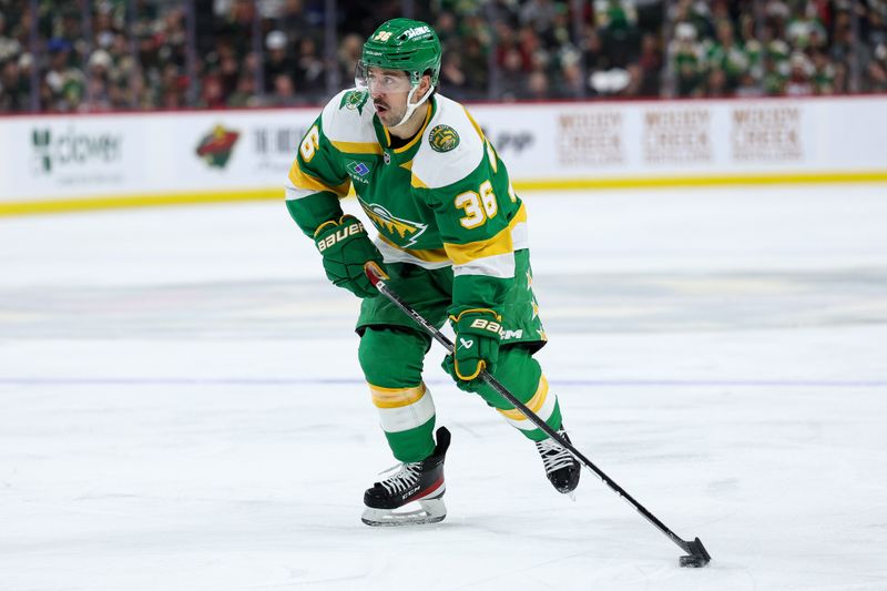 Nov 9, 2025; Saint Paul, Minnesota, USA; Minnesota Wild right wing Mats Zuccarello (36) skates with the puck during the second period against the Calgary Flames at Grand Casino Arena. Mandatory Credit: Matt Krohn-Imagn Images