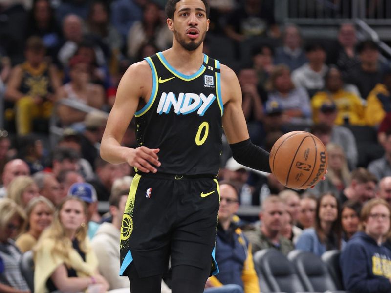 INDIANAPOLIS, IN - APRIL 7:  Tyrese Haliburton #0 of the Indiana Pacers dribbles the ball during the game against the Miami Heat on April 7, 2024 at Gainbridge Fieldhouse in Indianapolis, Indiana. NOTE TO USER: User expressly acknowledges and agrees that, by downloading and or using this Photograph, user is consenting to the terms and conditions of the Getty Images License Agreement. Mandatory Copyright Notice: Copyright 2024 NBAE (Photo by Pepper Robinson/NBAE via Getty Images)