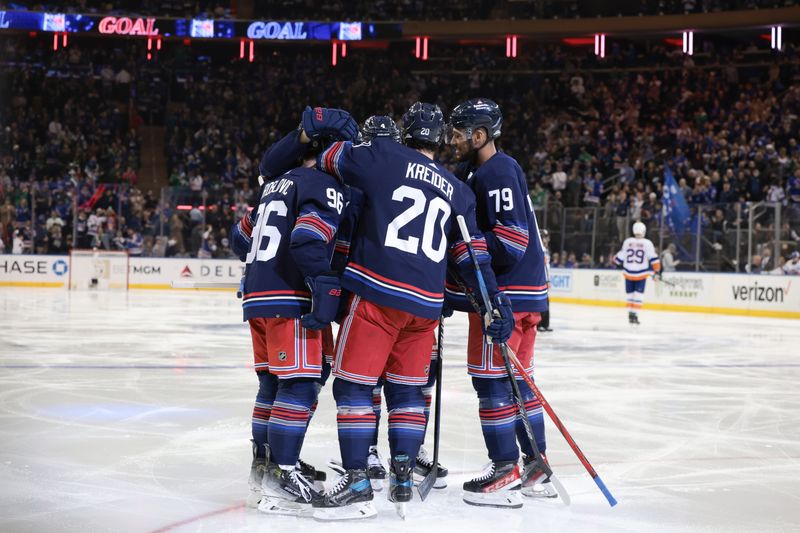 Mar 17, 2024; New York, New York, USA; New York Rangers center Mika Zibanejad (93) celebrates his goal with teammates during the second period against the New York Islanders at Madison Square Garden. Mandatory Credit: Vincent Carchietta-USA TODAY Sports