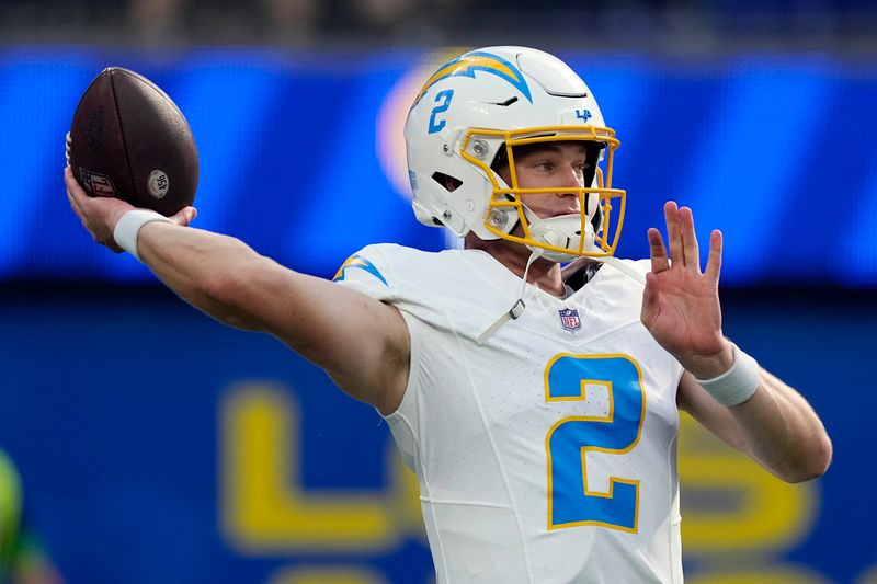 Los Angeles Chargers quarterback Easton Stick warms up before a preseason NFL football game against the Los Angeles Rams Saturday, Aug. 12, 2023, in Inglewood, Calif. (AP Photo/Mark J. Terrill)