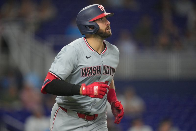 Sep 3, 2024; Miami, Florida, USA;  Washington Nationals first baseman Joey Gallo (24) watches his three-run home run during the fourth inning against the Miami Marlins at loanDepot Park. Mandatory Credit: Jim Rassol-Imagn Images.