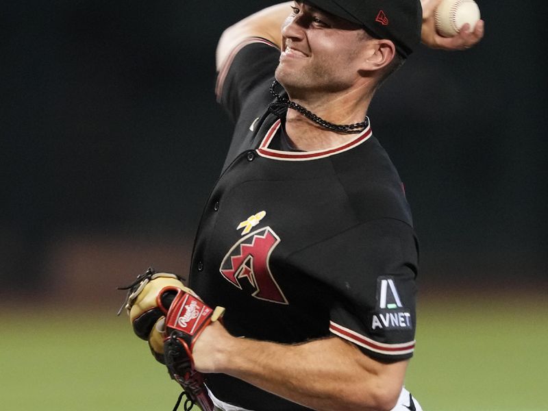 Sep 3, 2023; Phoenix, Arizona, USA; Arizona Diamondbacks relief pitcher Bryce Jarvis (40) pitches against the Baltimore Orioles during the seventh inning at Chase Field. Mandatory Credit: Joe Camporeale-USA TODAY Sports