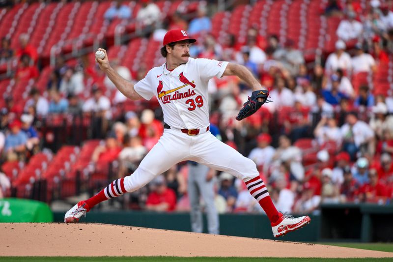 Jun 10, 2025; St. Louis, Missouri, USA;  St. Louis Cardinals starting pitcher Miles Mikolas (39) pitches against the Toronto Blue Jays during the first inning at Busch Stadium. Mandatory Credit: Jeff Curry-Imagn Images