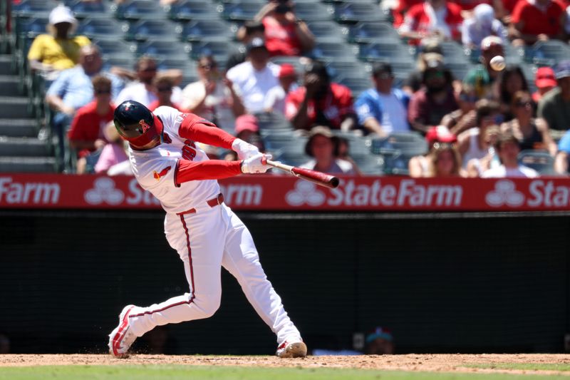 Jul 28, 2024; Anaheim, California, USA;  Los Angeles Angels left fielder Taylor Ward (3) hits a grand slam during the fourth inning against the Oakland Athletics at Angel Stadium. Mandatory Credit: Kiyoshi Mio-USA TODAY Sports