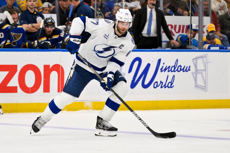 Nov 5, 2024; St. Louis, Missouri, USA;  Tampa Bay Lightning defenseman Victor Hedman (77) controls the puck against the St. Louis Blues during the third period at Enterprise Center. Mandatory Credit: Jeff Curry-Imagn Images