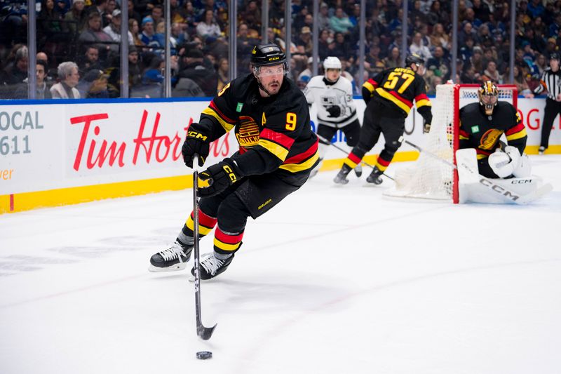 Feb 29, 2024; Vancouver, British Columbia, CAN; Vancouver Canucks forward J.T. Miller (9) handles the puck against the Los Angeles Kings in the first period at Rogers Arena. Mandatory Credit: Bob Frid-USA TODAY Sports